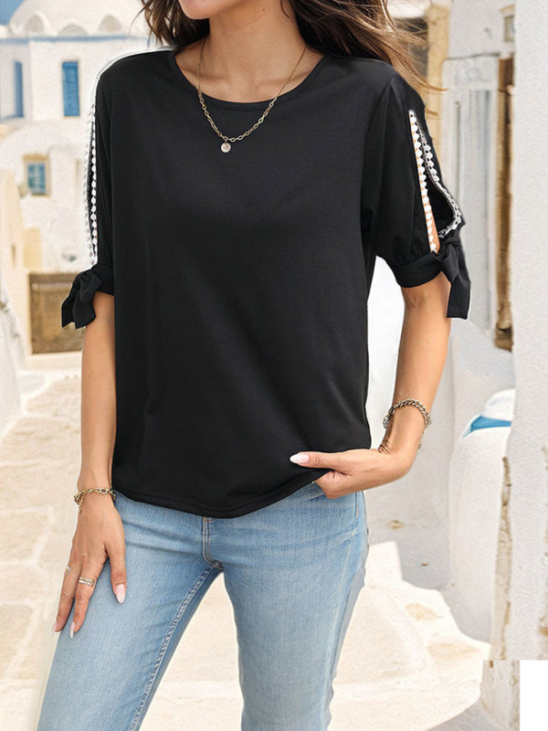 Women's black top with hollow shoulders